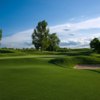 A view of hole #3 with bunker in foreground at CommonGround Golf Course