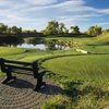 A view from Dunes at Riverdale Dunes Knolls Public Links with bench in foreground